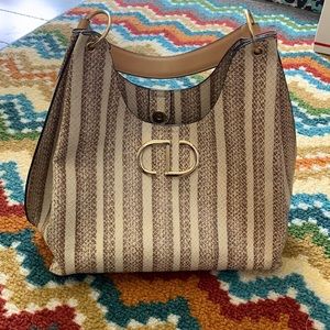 Gianni Bini, cream and tan purse.